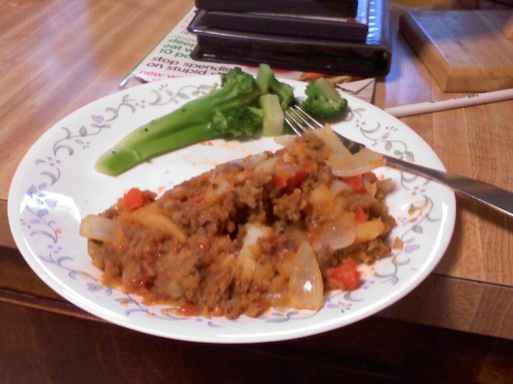 Milford NH :: Hamberger, onions, peppers, garlic, ketchup, and potatoes! with broccoli on da side! 

:) yum!