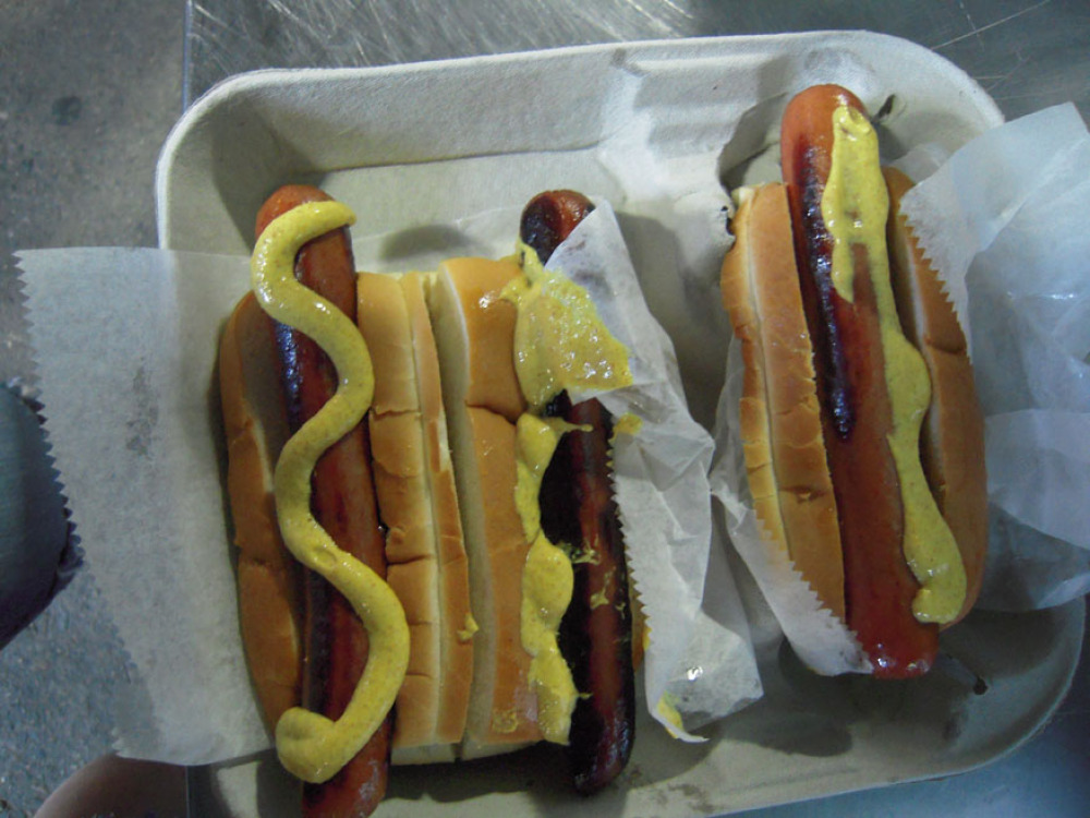 Fenway Park Boston, MA :: 3 fenway franks with some mustard waiting to be gobbled up!!!