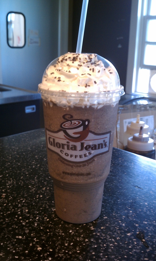 Gloria Jeans Coffees Bedford NH :: cookies n creme frozen beverage with whipped cream and chocolate sprinkles. the drink contains a mocha base and oreo cookies!  go get one at Bedford Gloria Jeans Coffees, they are super yummy!