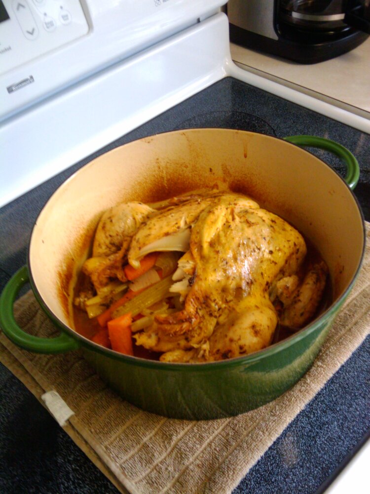 Orlando FL :: whole chicken stuffed with veggies and herbs slow cooked in a Dutch oven.