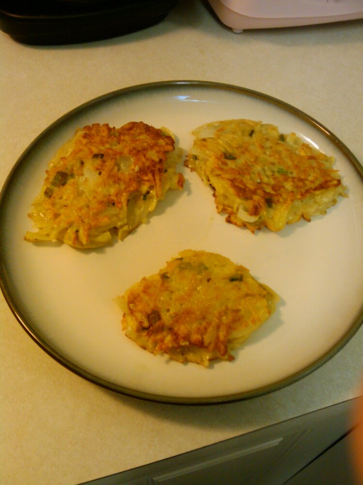 Orlando, FL :: Potato pancakes with onions, chives and spices. 