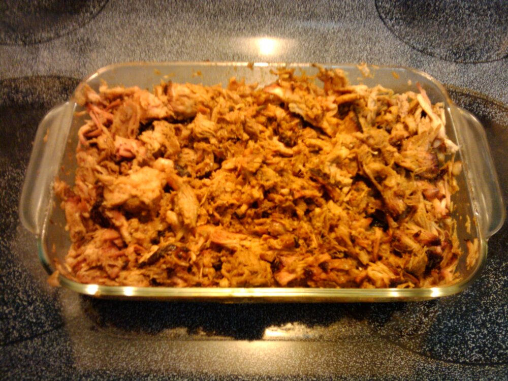 Orlando, FL :: 1st attempt at pulled pork. 9 hours on the grill. Done at 3 am. Made my own rub and sauce.It tastes awesome!Glad I did IT! 
