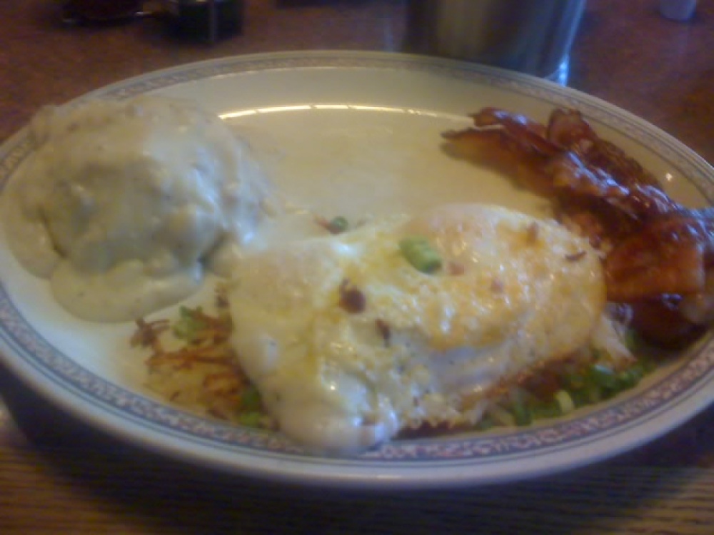 Vancouver, WA :: my favorite breakfast at Shari's. its biscuits and gravy. and then a fried egg ON TOP OF the stuffed hasbrowns(which are stuffed with cheese and sour cream. and topped with bacin bits) and then a couple strips of bacon