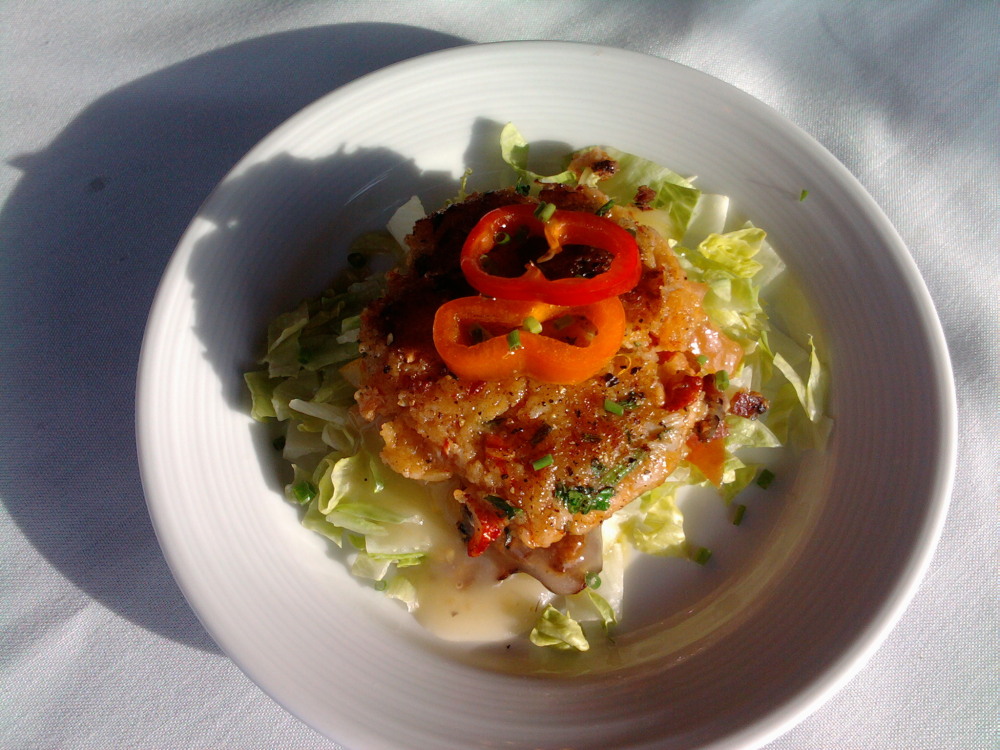 eastern ct :: pan fried crab cake over heirloom grape tomato salad 