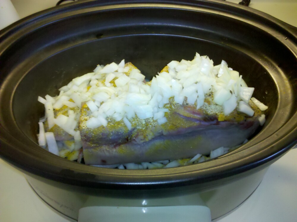 home :: beef tongue in crock pot.. w.chopped onions..