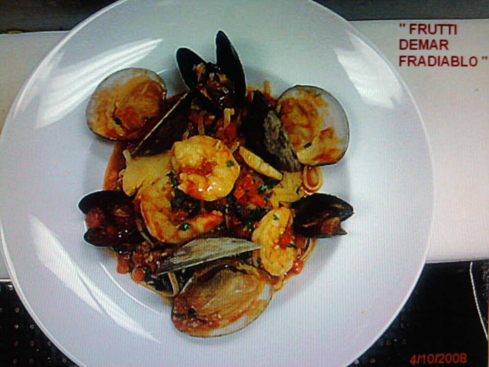 eastern ct :: shrimp,scallops,mussles and clams in a spicy marinara with linguini