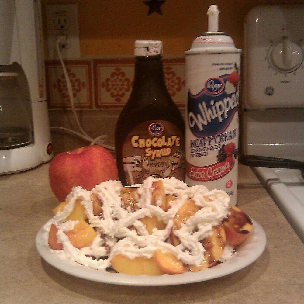 AZ :: chopped peaches on bottom. chocolate syrup on top then whipping cream 
x2 layers. 