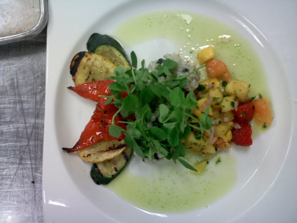 everett ma :: coconut rissotto with a passion fruit salsa grilled veg and scallion oil topped with pea greens