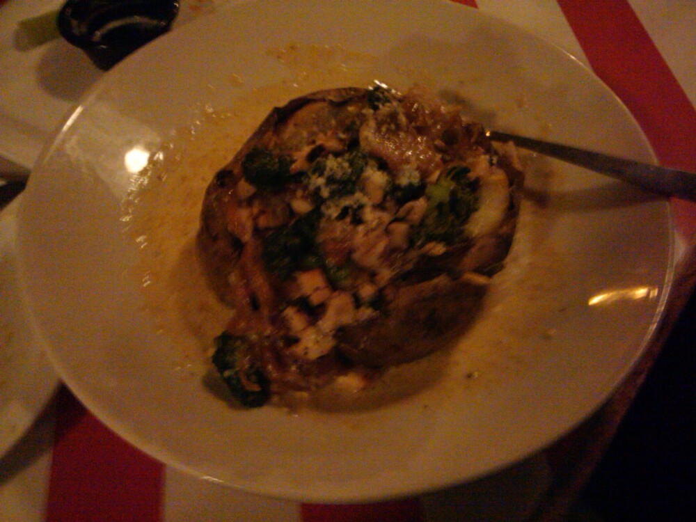 Long Beach :: chicken and brocolli stuffed backed potato with alfredo sauce on top. 