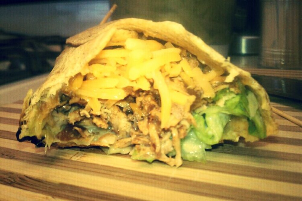ALLENTOWN,PA :: shredded chicken seasoned to my taste,sauteed onions and peppers,ranch,lettuce,cheddar on a spinach and herb tortillas wrap. 