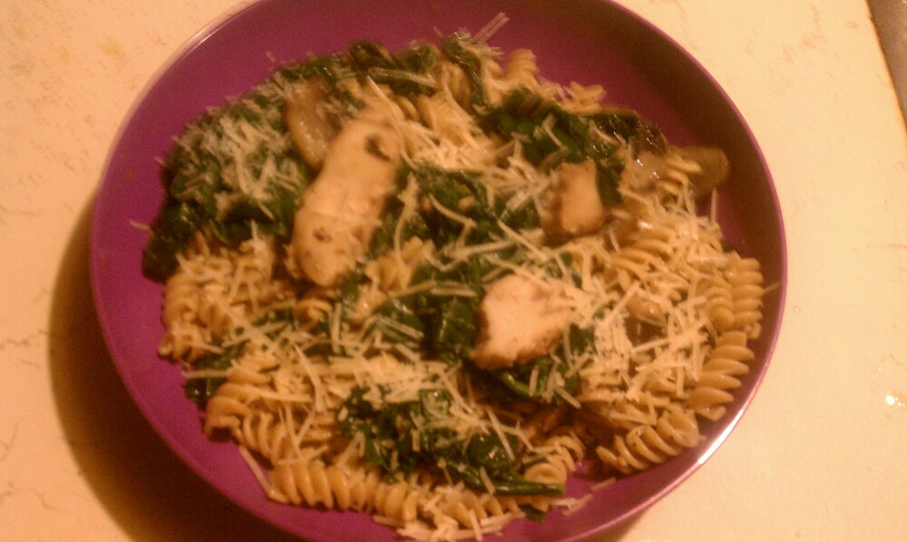 Ferndale, MI :: Pasta with sauteed spinach and mushrooms with grilled chicken strips.