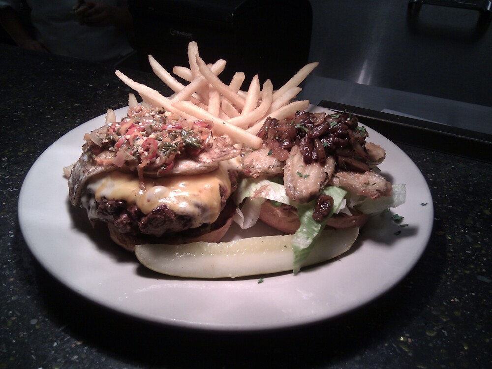 Gatehouse Tavern, Wake Forest, N.C. :: a 10 oz burger with homemade sausage, cheddar and mozzarella, a habanero pepper blend, Guinness onions, fried pickles, shredded lettuce... I think I forgot something...