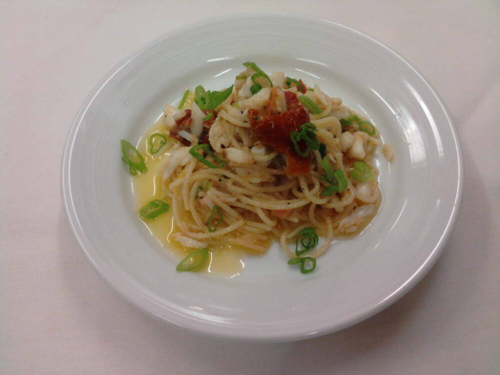 eastern ct :: crab with roasted tomato and angel hair pasta tossed in a lemon zest pickled ginger wine butter. 