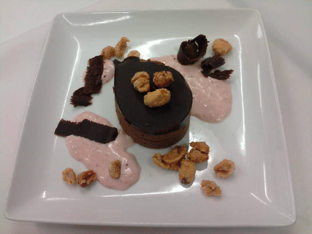 eastern ct :: chocolate peanut butter mousse with sugared peanuts and strawberry cremma. I tried to shave some chocolate for spirals but it didn't cooperate so the garnish looks like crap ha 