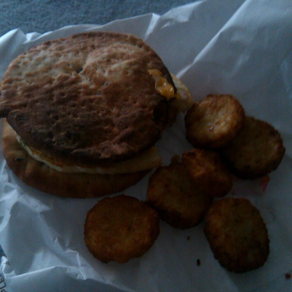 dunkin donuts  Baltimore md :: really burnt veggie egg white flat bread & hash browns.