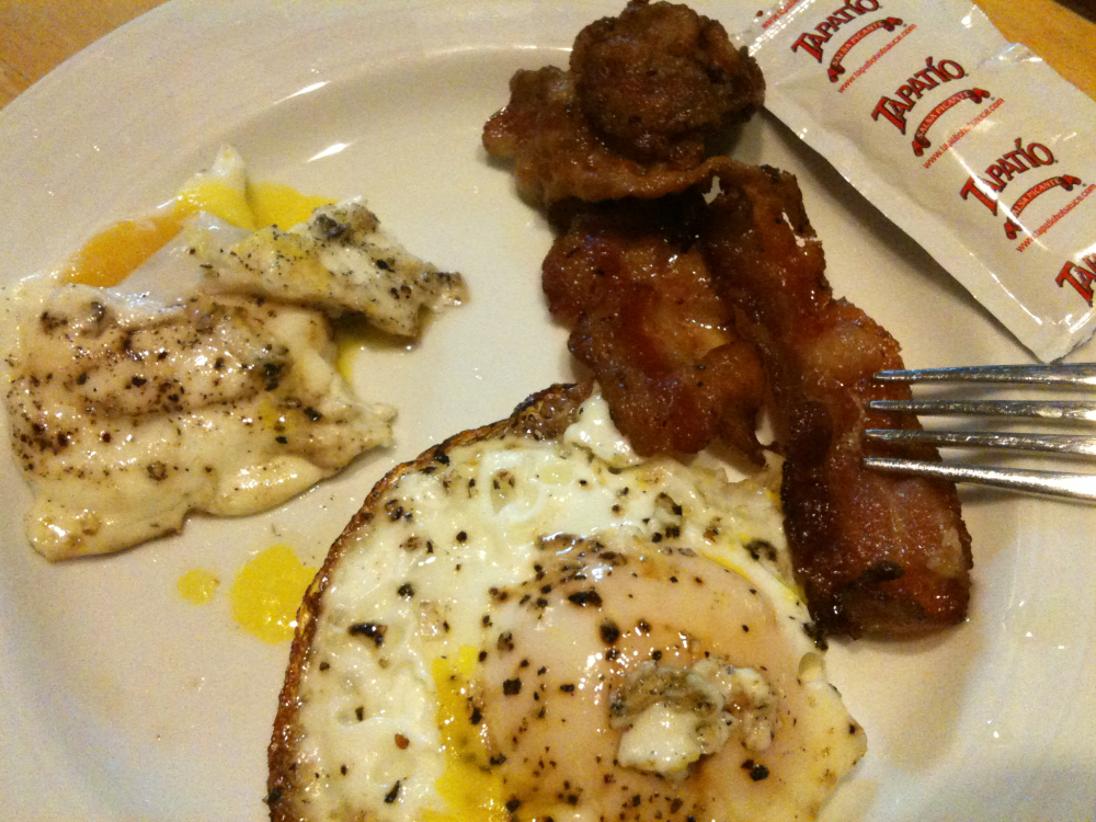 Cambridge  :: Late night egg, bacon, hot sauce packet snack!  I took this before the toast was done.  Oops!!