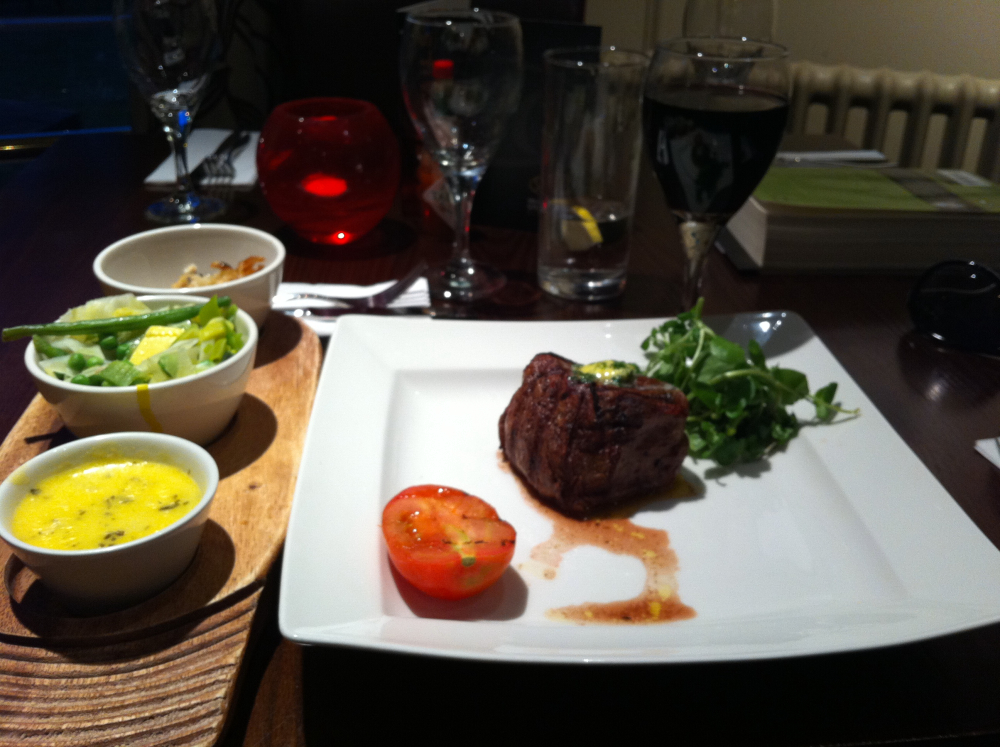 Miller & Carter, Wilsmlow, Cheshire, England :: Petite fillet, roasted tomato, mixed greens and bergnaigse sauce. 