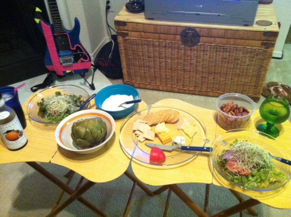 Texas home :: Cheese plate w/ glazed pecans, artichoke and dip, garden salad, cheap Chardonnay. 