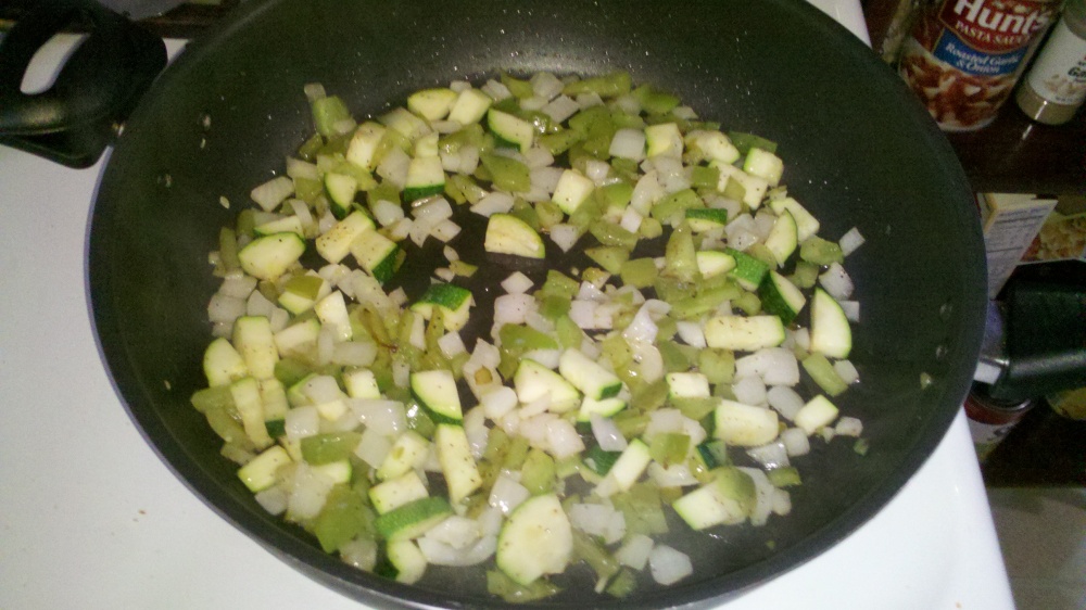 new britain ct :: making spaghetti sauce, green pepper, onions, and zuchini browning up :)