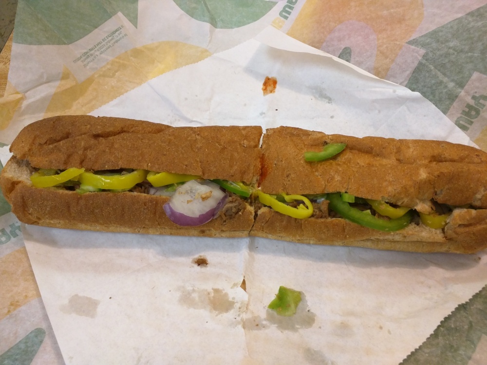 Subway in Plainville CT :: Steak and cheese on wheat: American, onions, peppers, banana peppers, buffalo sauce, mayonnaise.  THE BEST