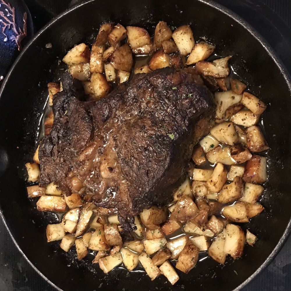 Plainville, CT, USA :: Cast iron skillet, chuck roast and seasoned potatoes!