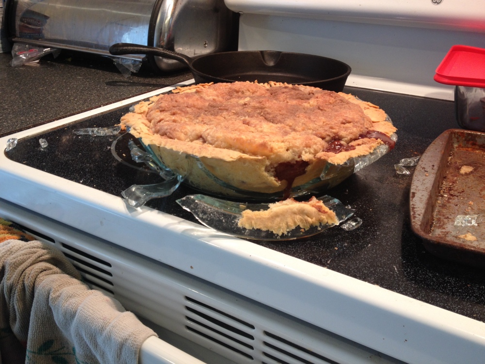 Plainville, CT, USA :: I was baking an apple pie for Pi Day but little did I know that putting a hot pyrex pie pan on a flat stovetop was a bad idea. POP glass went everywhere.  Didn't get to eat this....