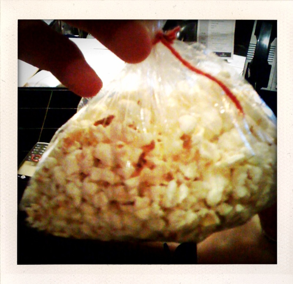 Marrioitt back room Cambridge, MA :: popcorn in a bag that Jessa gave me because I sent her a text saying I wanted popcorn!" I like popcorn!
