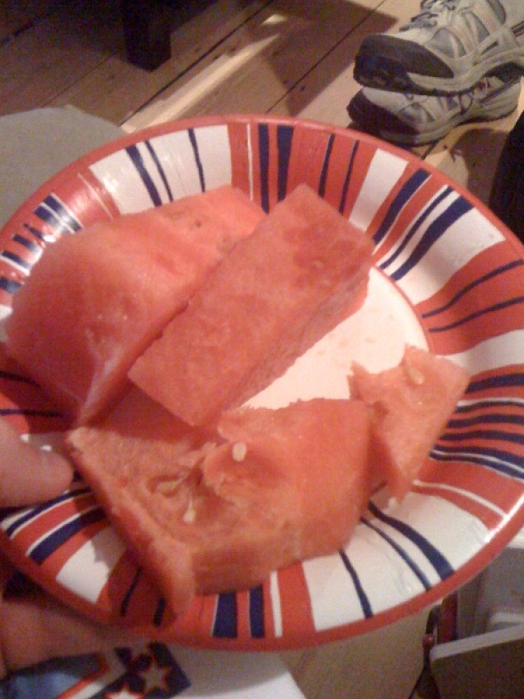 Cousin Sara and Gabi's place Cambridge, MA :: Watermelon never tasted to good on a paper plate... I spilt some watermelon juice on my white-shirt but it washed out