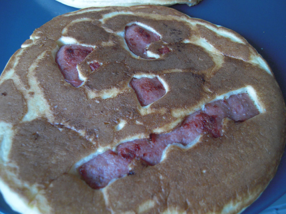 Brothers house Greenbelt, MD :: when was the last time you were in charge of making break-fast??? well when my brothers and I get together we make breakfast items with hot-dogs... this is a pancake with a hot-dog face!