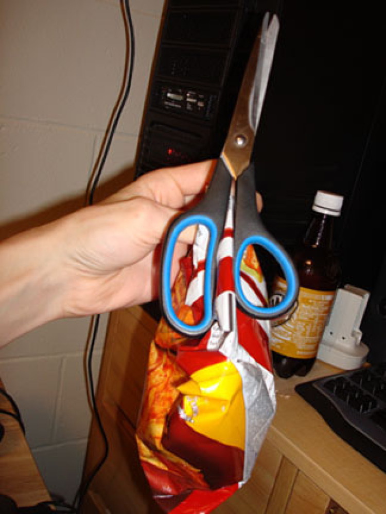 Keene State College in NH :: I bought this bag of Munchies from the Campus Convenience corner store. I didn't have a chip clip, so I made clever use of my scissors.