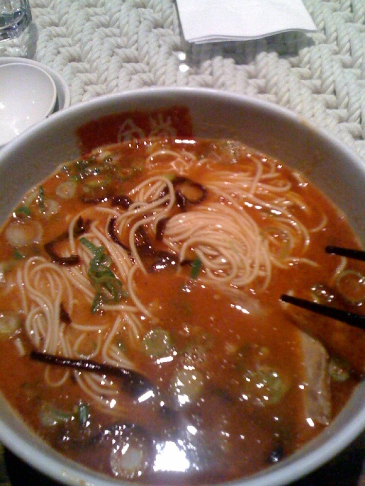 IPPUDO NY 65 Fourth Avenue :: this is a bowl of fresh Ramon soup!  when you walk in and during the whole time when you are slurping your soup the staff is what it seams like yelling... but I think they are just talking....  the soup is good and instead of a clean plate I had a clean bowl!