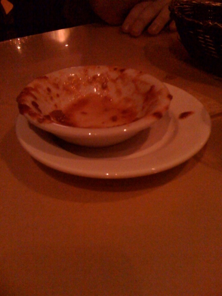 some bad Tex Mex place in NYC :: this is an empty dish of salsa.... it looked like they had put it through a blender on "destroy" setting!! 