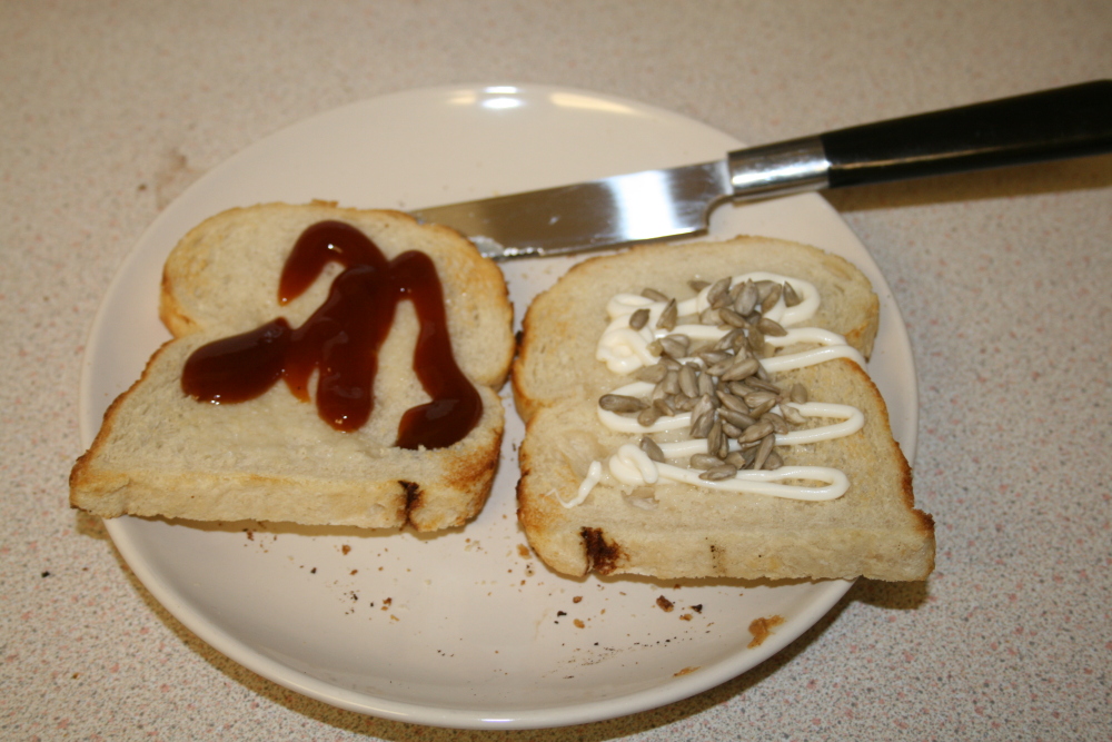 Wolverhampton, England :: Toast with garlic, BBQ sauce, Sunflower seeds and Mayo.