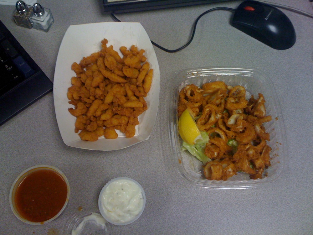 Marriott Back Room :: a fried clam strip and a fried calamari....  chewy and gross... but we finished them... the tarter sauce had small pickles so it looked and tasted just like tarter sauce with out pickles!