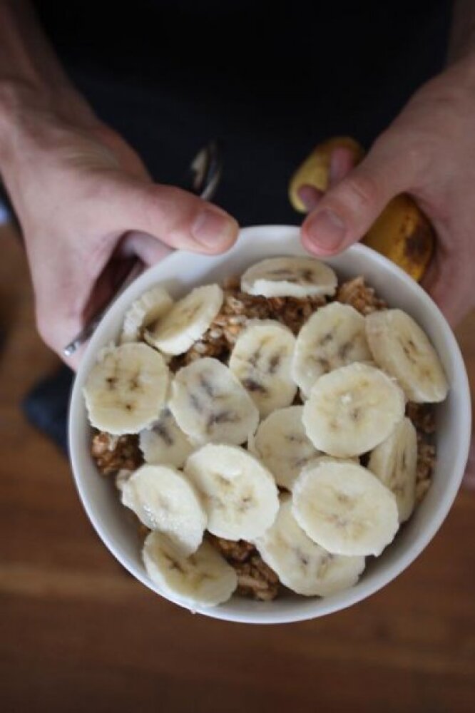 Cambridge,MA :: Terrified Sliced Bananas on top of Vanilla Yogurt & Granola.