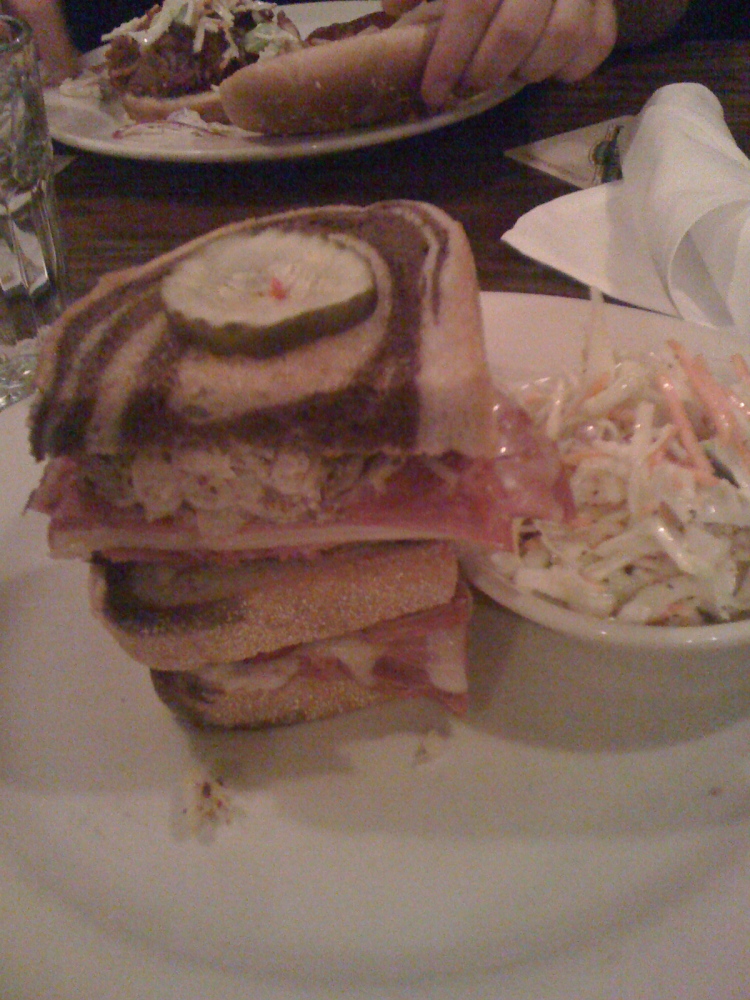 Rock Bottom - www.rockbottom.com :: I am a sucker for reuben sandwiches... I saw this on the menu and just HAD to order it.... it was ok for a crappy place to eat...  The staff is not trained to take orders correctly though... my brother ordered a Pulled Pork Sandwich and he got a Turkey Club... he told the wait staff that he had ordered a Pulled Pork Sandwich... they told him he didnt even though everyone at the table agreed that he had ordered the Pork....  how lazy are we to bluntly lie just to reduce burning extra calories!  go to the gym and give my brother his correct order!  