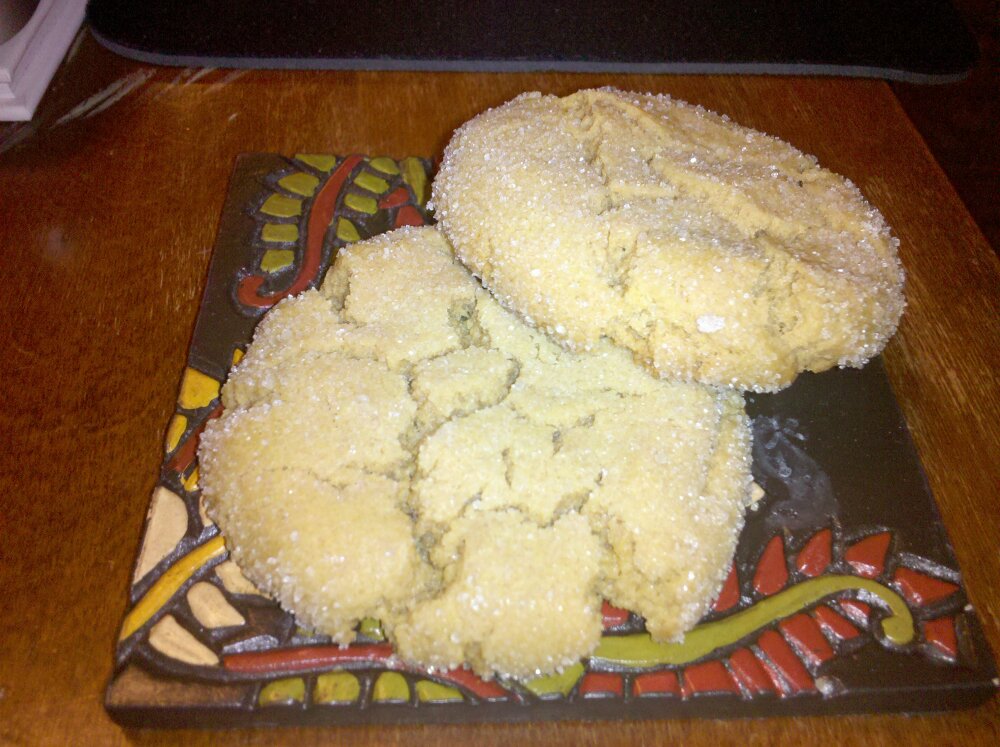 Greenbelt, MD :: **Sensational Peanut Butter Cookies**
Yield: 18 cookies
1 cup peanut butter (see note)
3/4 cup natural cane sugar
1/4 cup brown sugar
1 egg
1 teaspoon baking soda
1/2 teaspoon vanilla
additional sugar for rolling
Preheat oven to 375 degrees&Acirc;&deg;F.
Mix all the ingredients up in a bowl. Roll walnut-sized pieces into balls and roll balls in the additional sugar. Place on a parchment-lined baking sheet and flatten slightly with a fork in a crisscross pattern. Bake for 10 minutes. Remove and let cool before removing from baking sheet.