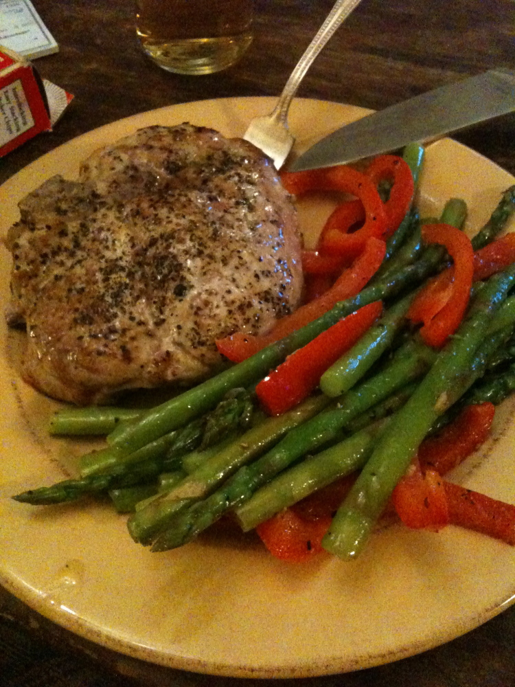 My house Cambridge, MA :: I went to whole foods to pick out a pork-chopper for dinner thinking it would be great... Well it was great!  on the side are some fresh asparagus and red-pepper tossed in a ginger infused oil!