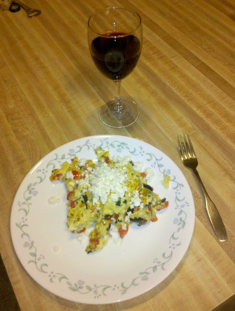Home, Milford, NH :: Eggs with red pepper, onions, garlic, ham, spinach, kalamata olives, topped with Feta cheese, and a glass of red wine.