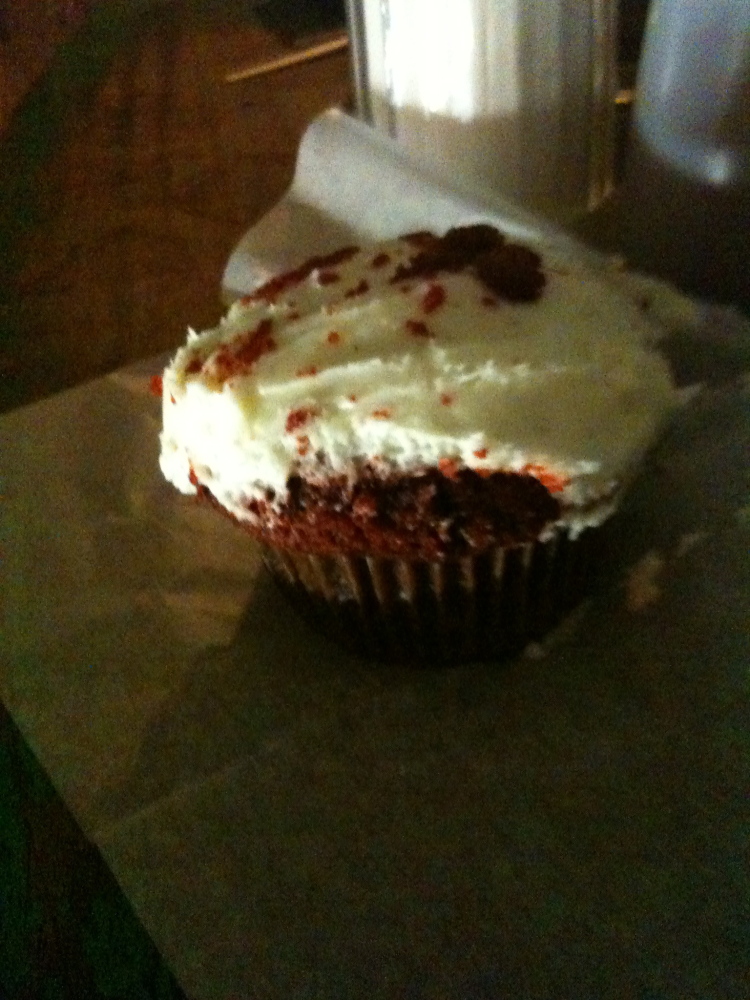 Cake Shop :: this is a coffee shop/bakery/rock venu in the lower east side of NYC.  this Red Velvet cupcake was hard to eat!  it kept on falling apart!!! and was not moist at all... but it was late in the evening so it could have been the time of day... I will have to try one when the sun is up