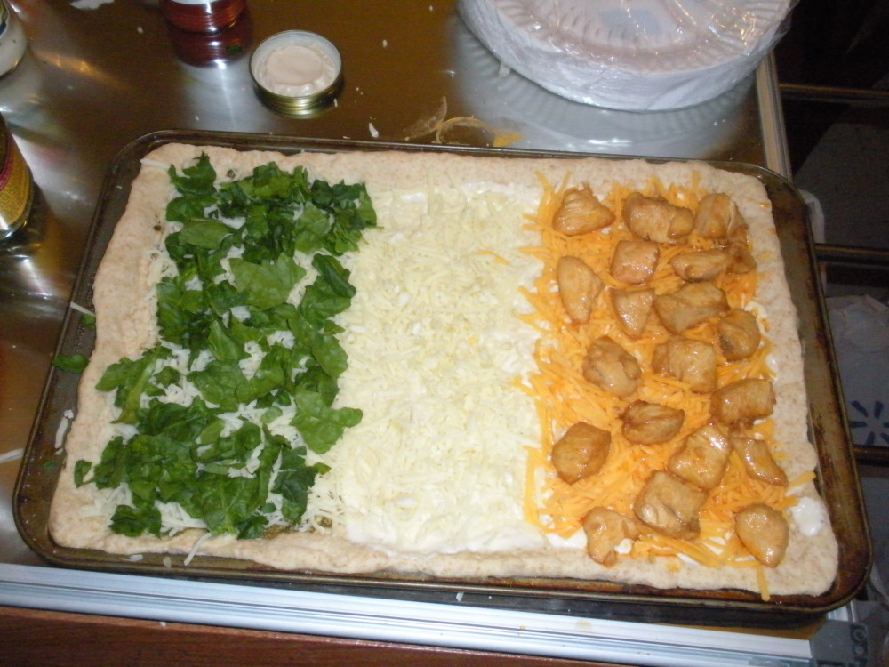Manchester, NH :: Italian Flag Pizza. On the left green side we have pesto, mozzarella, and spinach. In the white middle we have alfredo, mozzarella and garlic. And on the right orange is garlic-alfredo sauce, sharp cheddar and chicken soaked in homemade buffalo sauce.