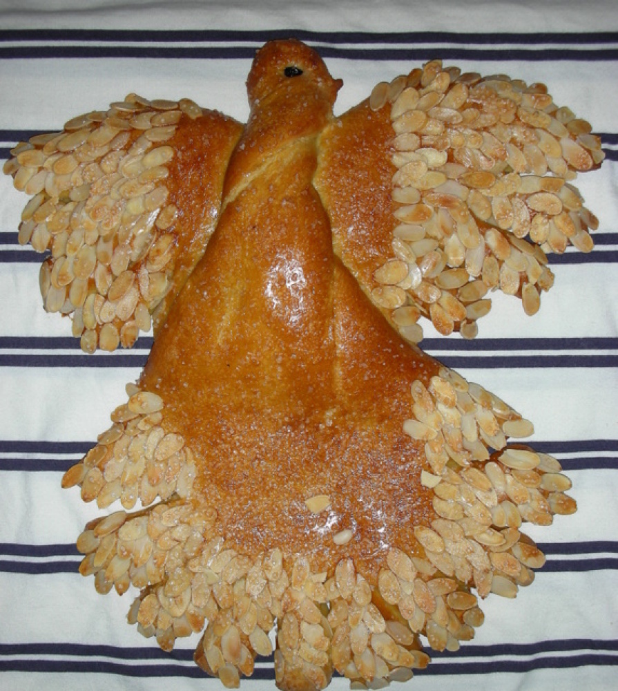 Mont Vernon, New Hampshire :: Easter Dove Bread. Baked by Yvonne at The Good Loaf in Milford, NH. Yummy with almond paste, orange rinds, sliced almonds for feathers and all kinds of real health ingredients. 18" by 12", it's pretty big!